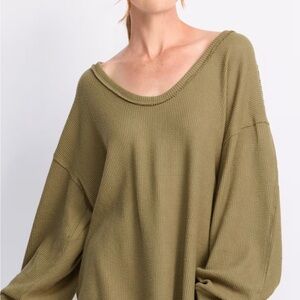 Oversized thermal top with vintage inspired waffle knit.